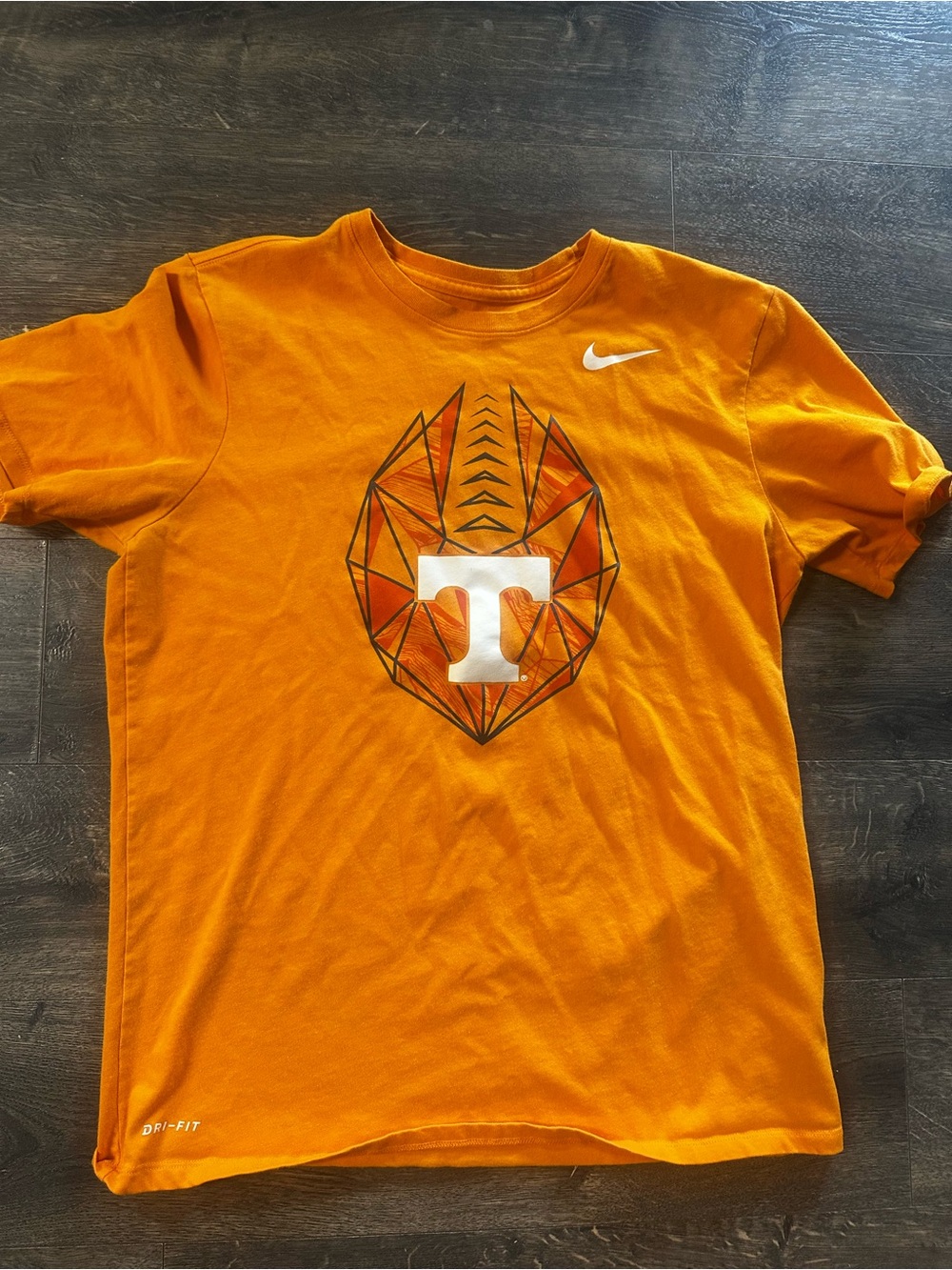 Nike Orange Short Sleeve Graphic Tee with White Logo and Geometric Chest